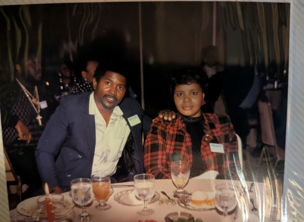 Samuel Gailyard & Shirley Owens Gailyard sitting at table